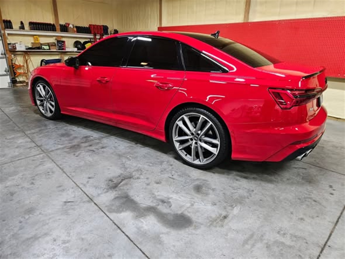 Red Audi S6 rear three-quarter detailed